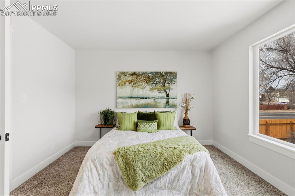 Image 14 of 32: Primary Bedroom with Natural Light