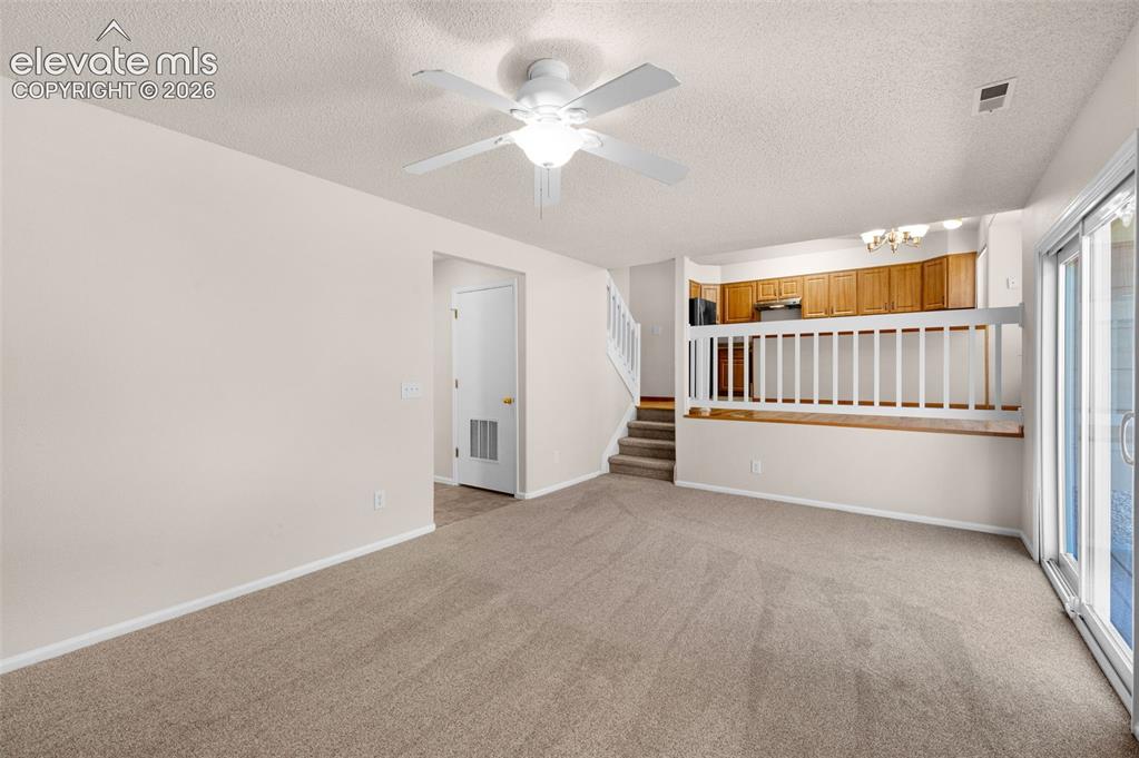 Image 15 of 44: family room looking towards the kitchen