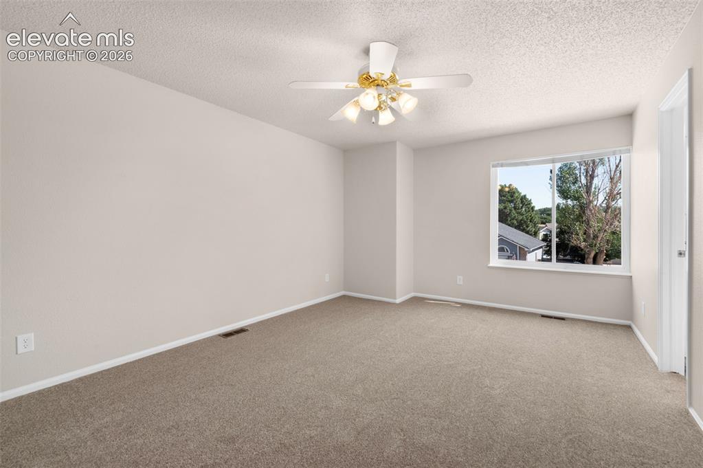 Image 19 of 44: bedroom with new carpet