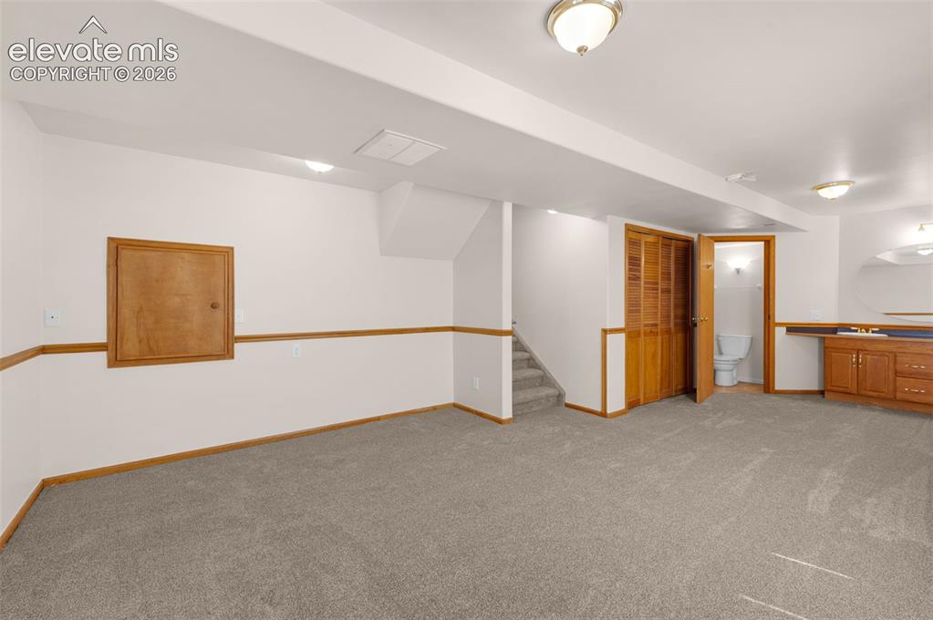 Image 31 of 44: Second family room, possible 4th bedroom