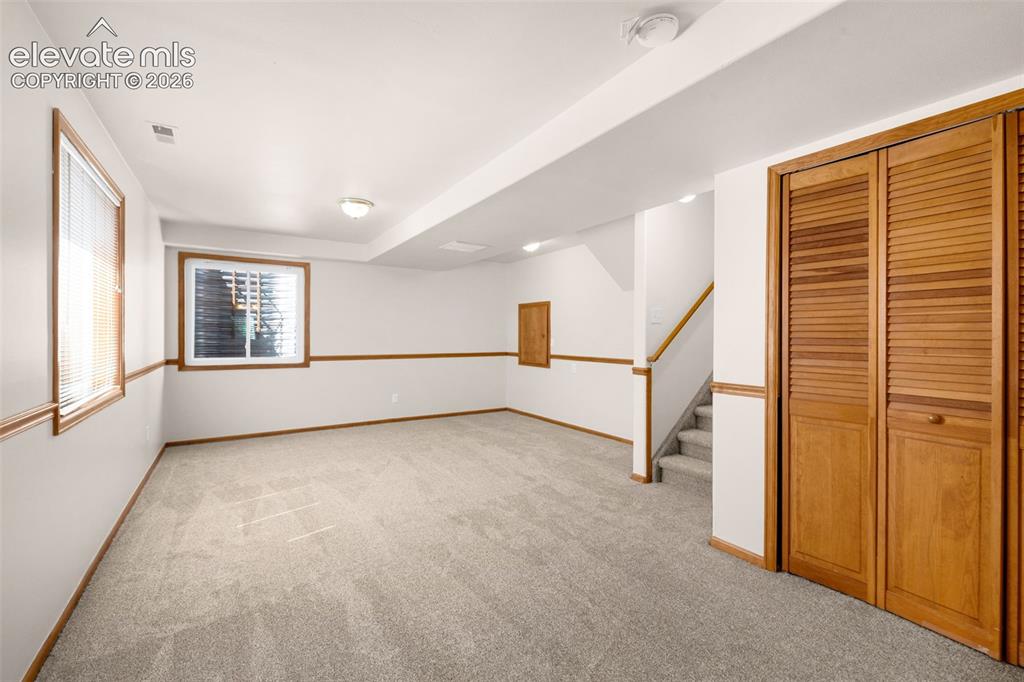 Image 32 of 44: 2nd family room or office & private bath