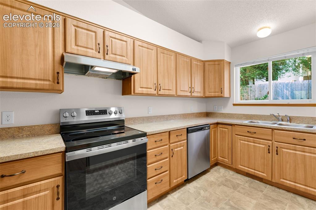 Image 7 of 44: kitchen with new appliances
