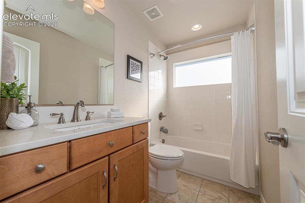 Image 32 of 48: Upstairs Hall Bath