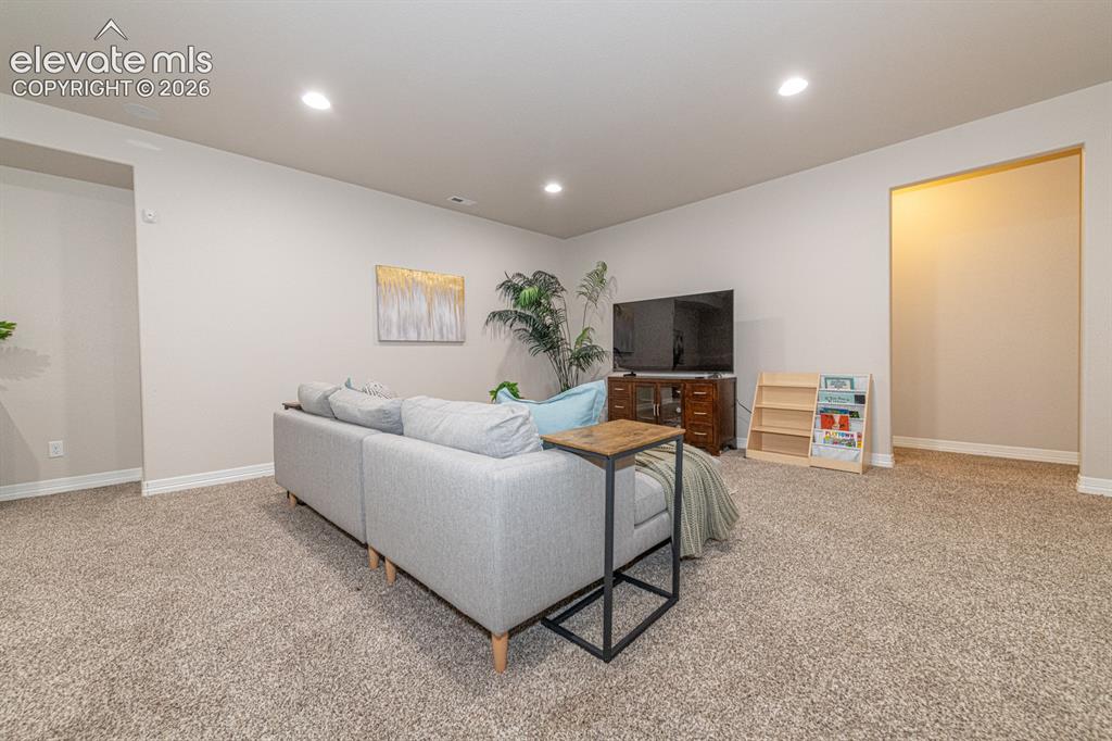 Image 35 of 48: Basement Family Room