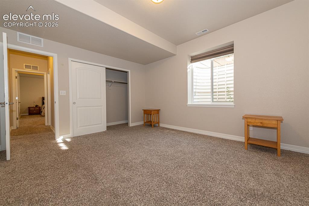 Image 39 of 48: Basement Bedroom 1
