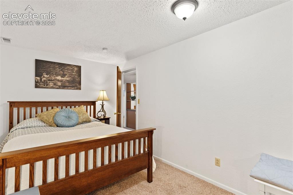 Image 32 of 43: Bedroom