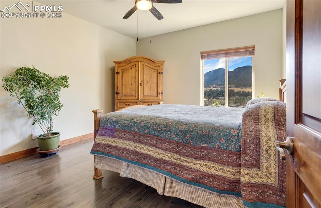 Image 27 of 49: 2nd bedroom with mountain views