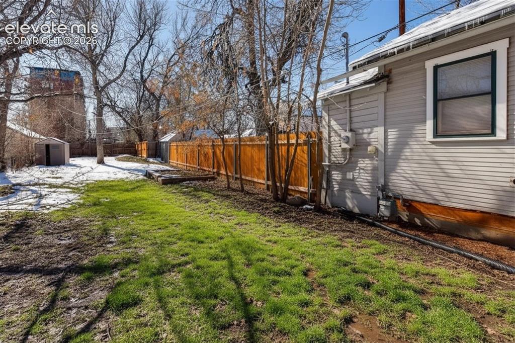 Image 26 of 27: Deep yard with lots of space to expand.