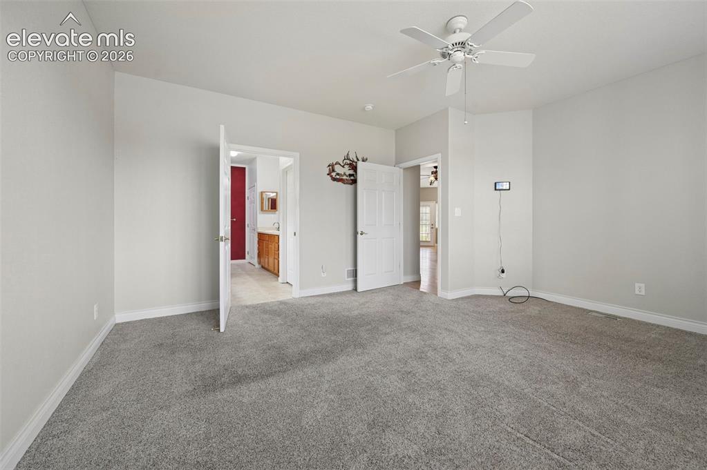 Image 9 of 28: Primary Bedroom