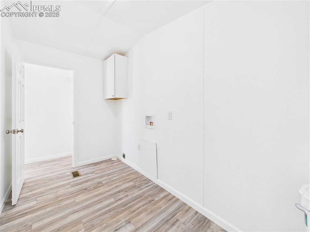 Image 38 of 49: Laundry Room (Alternate View) – Additional angle of the laundry/mudroom