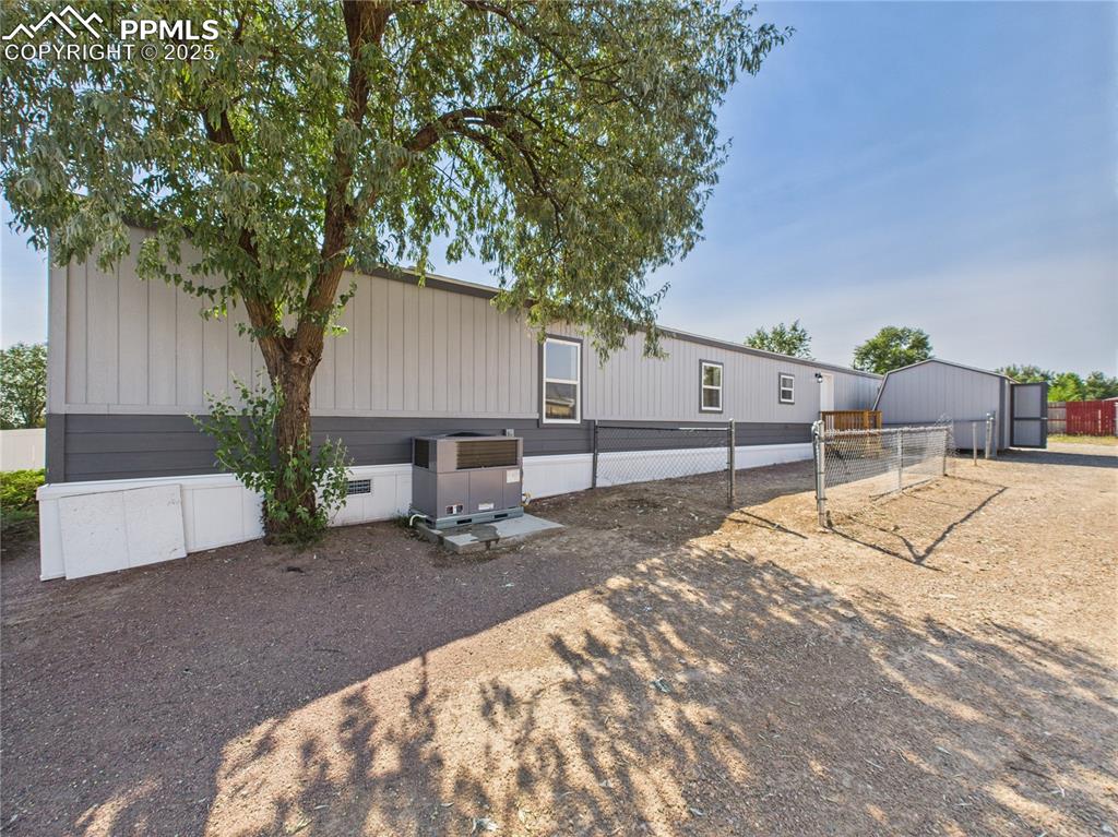 Image 42 of 49: Back Entrance View – Rear of the home