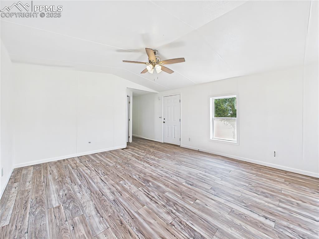 Image 7 of 49: Living Room (Alternate View) – A wide view of the inviting main living area