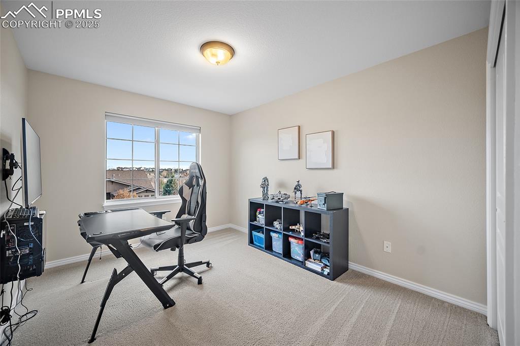 Image 33 of 50: 3rd upper level bedroom.