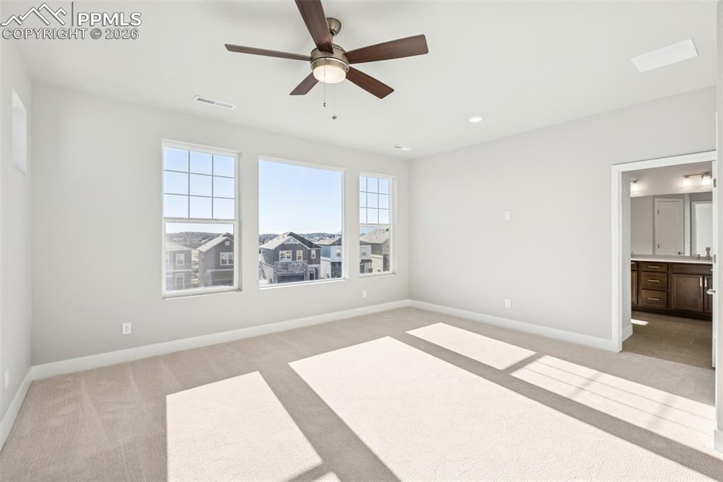 Image 19 of 29: Master Bedroom