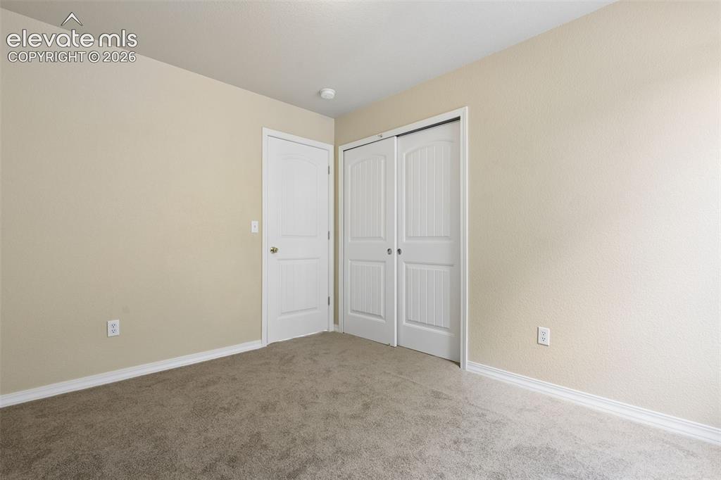 Image 31 of 38: Bedroom