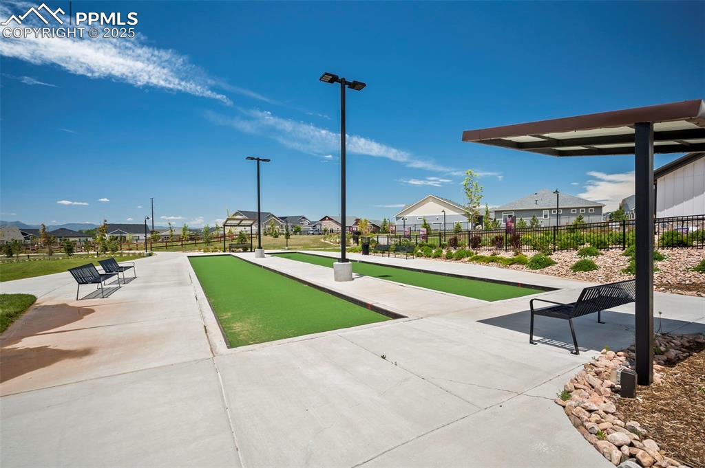 Image 38 of 43: Surrounding community featuring a game area and a residential view