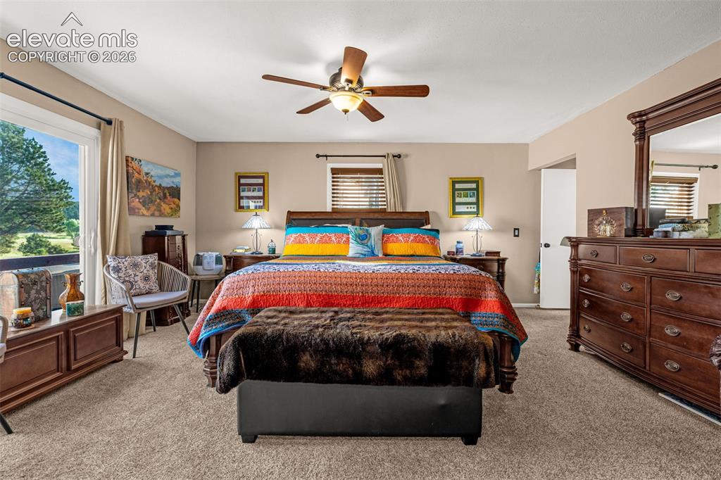 Image 12 of 21: Ample primary bedroom with ensuite bath