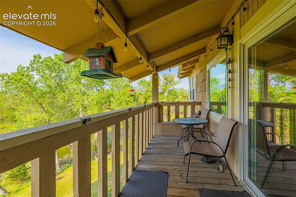 Image 17 of 21: Spacious balcony looking over Lake Woodmoor