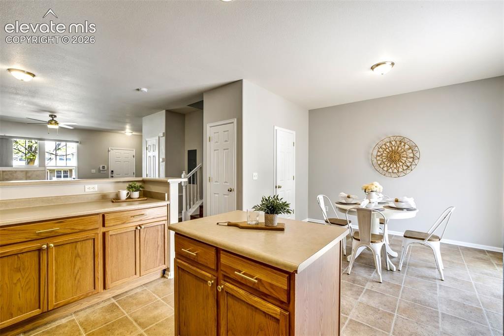 Image 9 of 40: Kitchen with a prep island. 