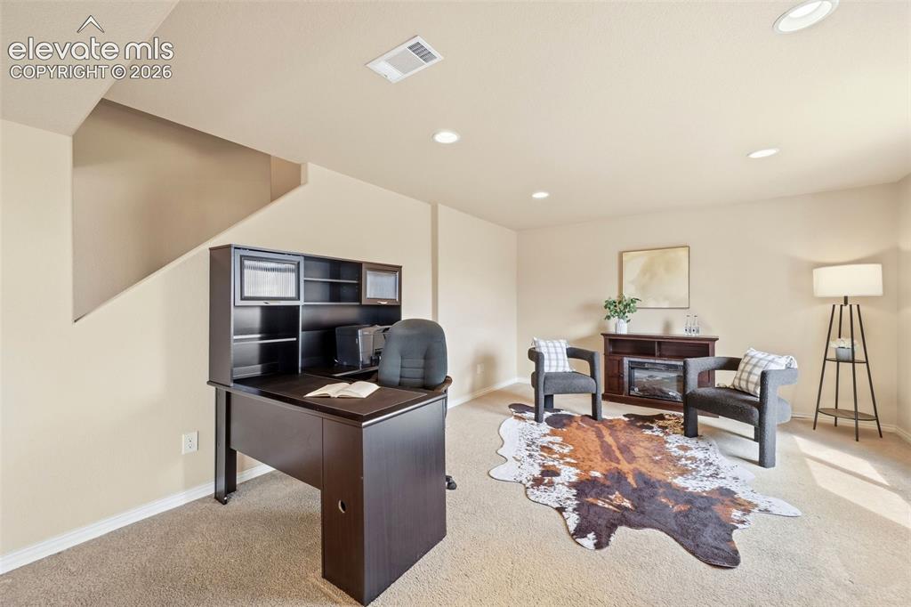 Image 15 of 40: Basement family room