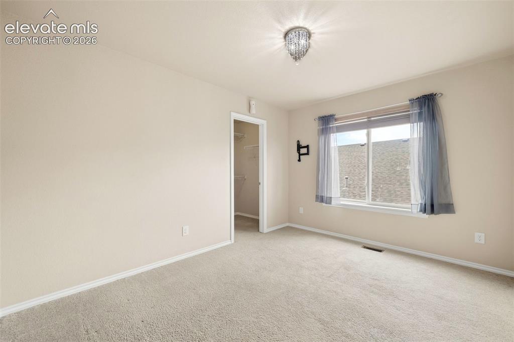 Image 22 of 40: Upstairs bedroom