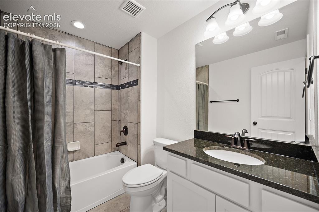 Image 28 of 36: Full bathroom in basement 