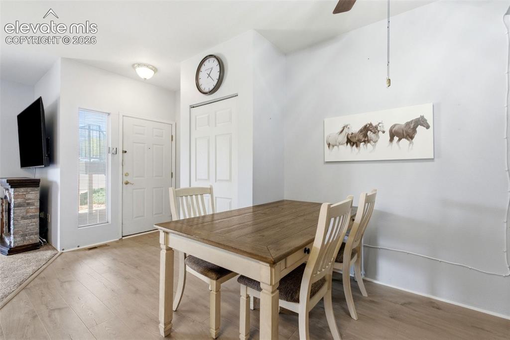 Image 5 of 25: Wood-finish flooring throughout