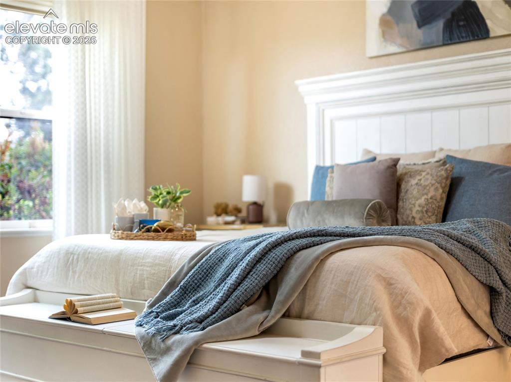 Image 14 of 29: Open sightlines keep the main level feeling bright and connected