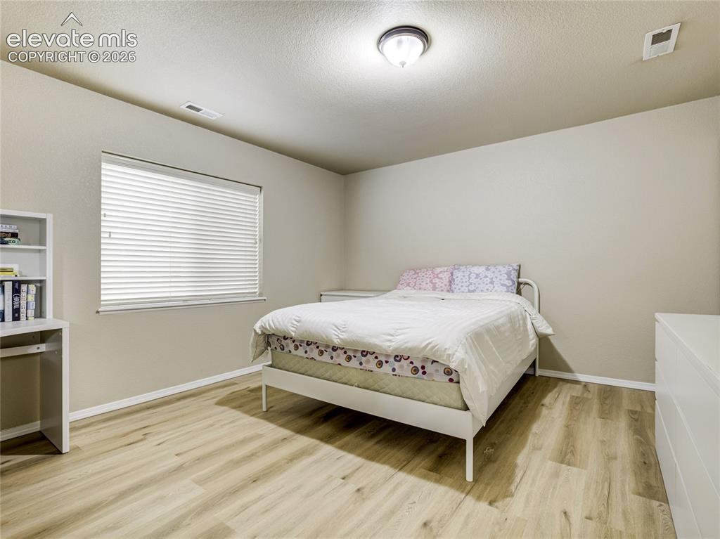 Image 22 of 29: Comfortable secondary bedrooms with convenient access to the bath