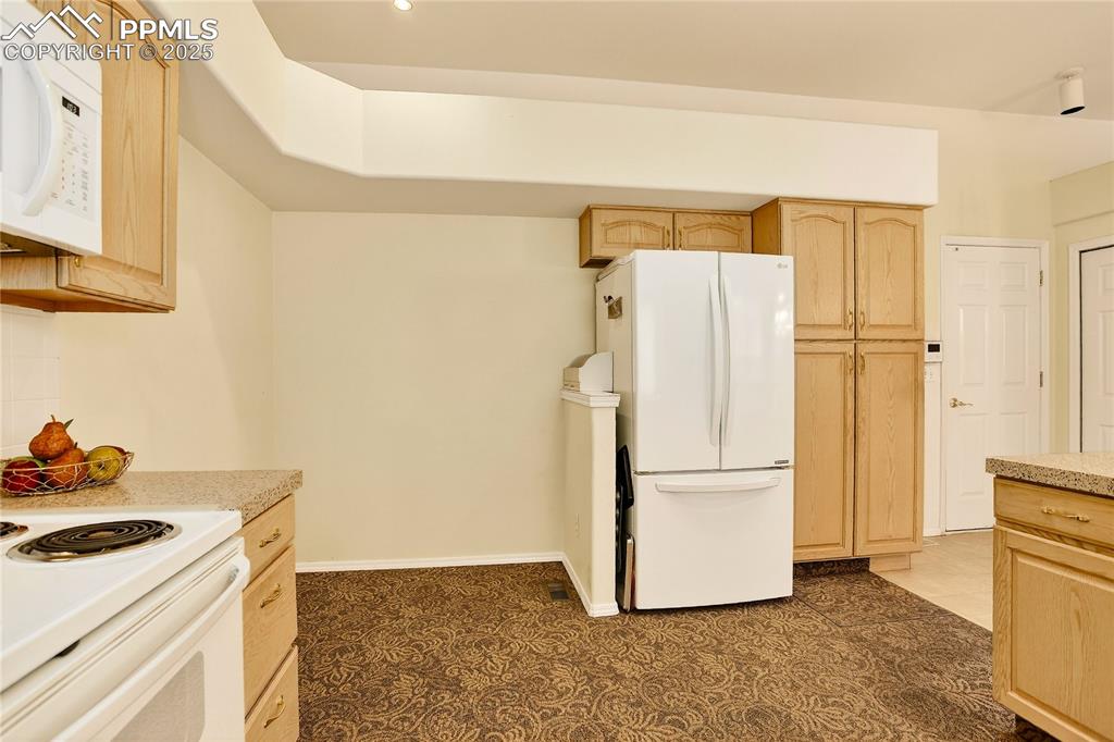 Image 9 of 21: Dining nook in kitchen