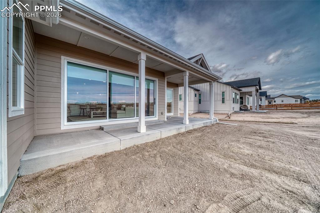 Image 50 of 50: Back of property with a patio area