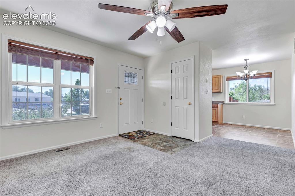 Image 9 of 35: Living room, eat-in kitchen