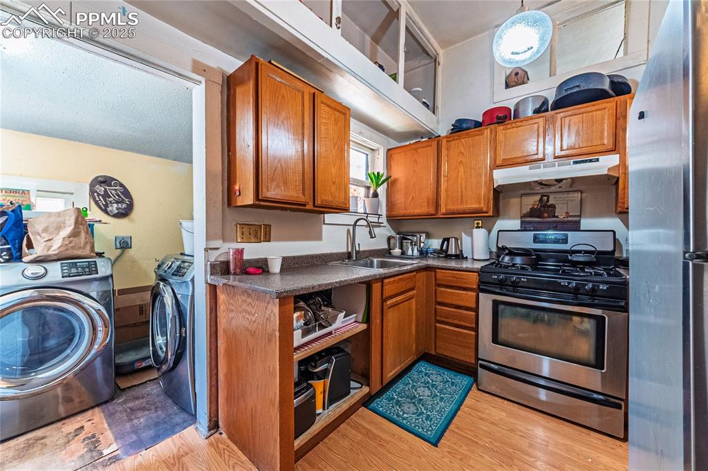Image 4 of 22: Kitchen featuring stainless steel appliances, Front Unit