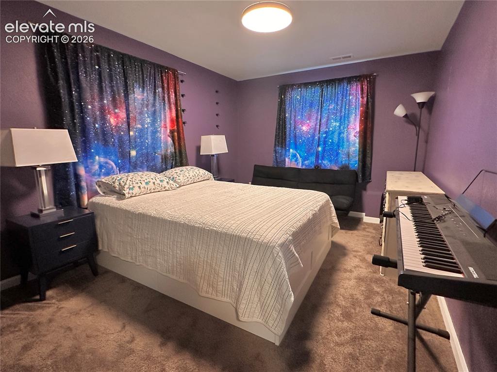 Image 22 of 30: Bedroom in basement