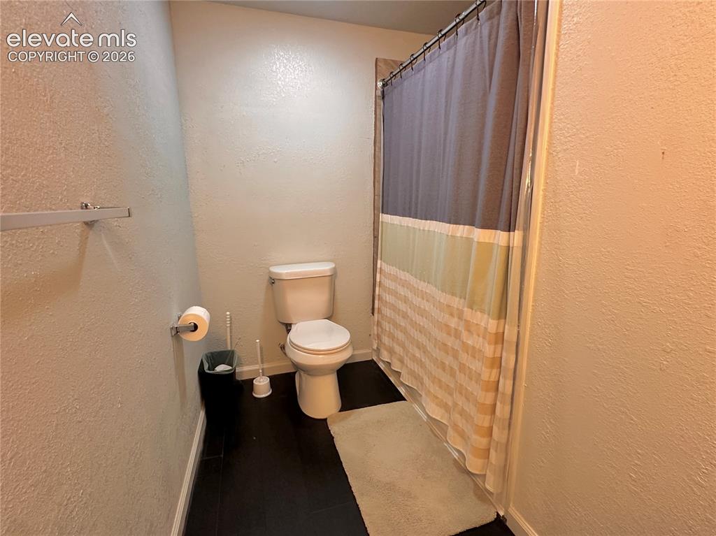 Image 23 of 30: Basement bathroom
