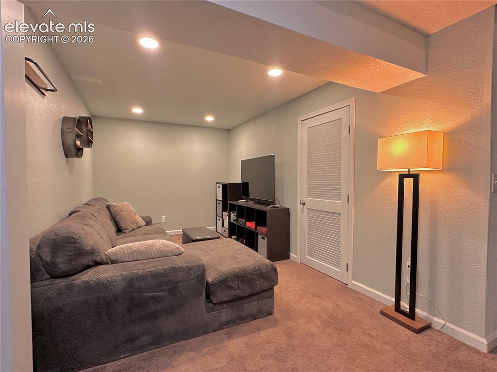 Image 25 of 30: Living room in basement