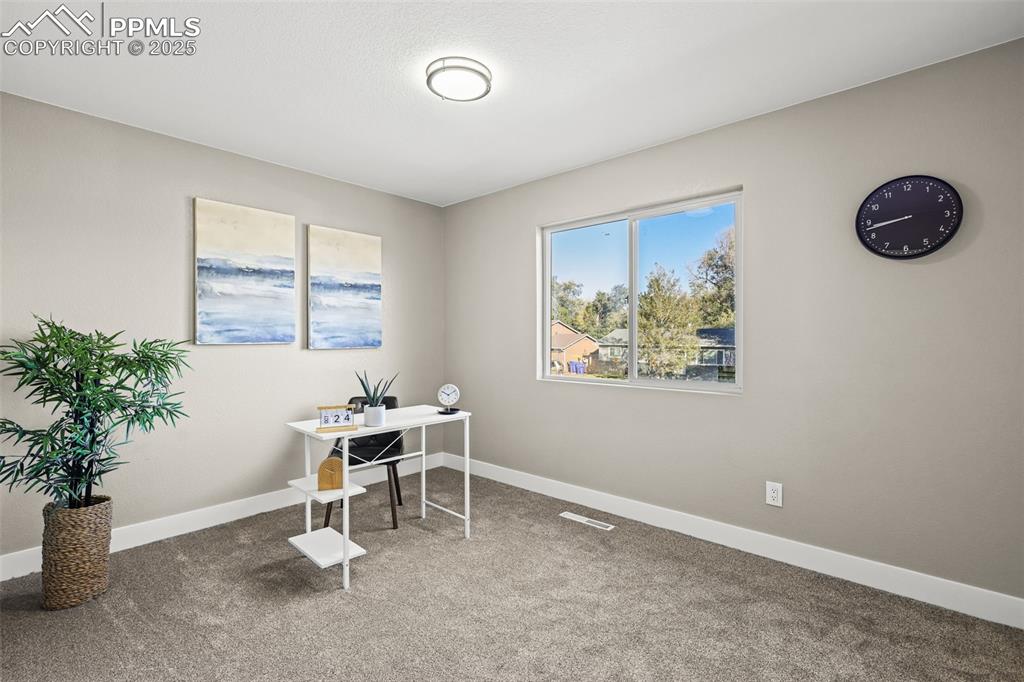 Image 7 of 15: Office featuring carpet and baseboards