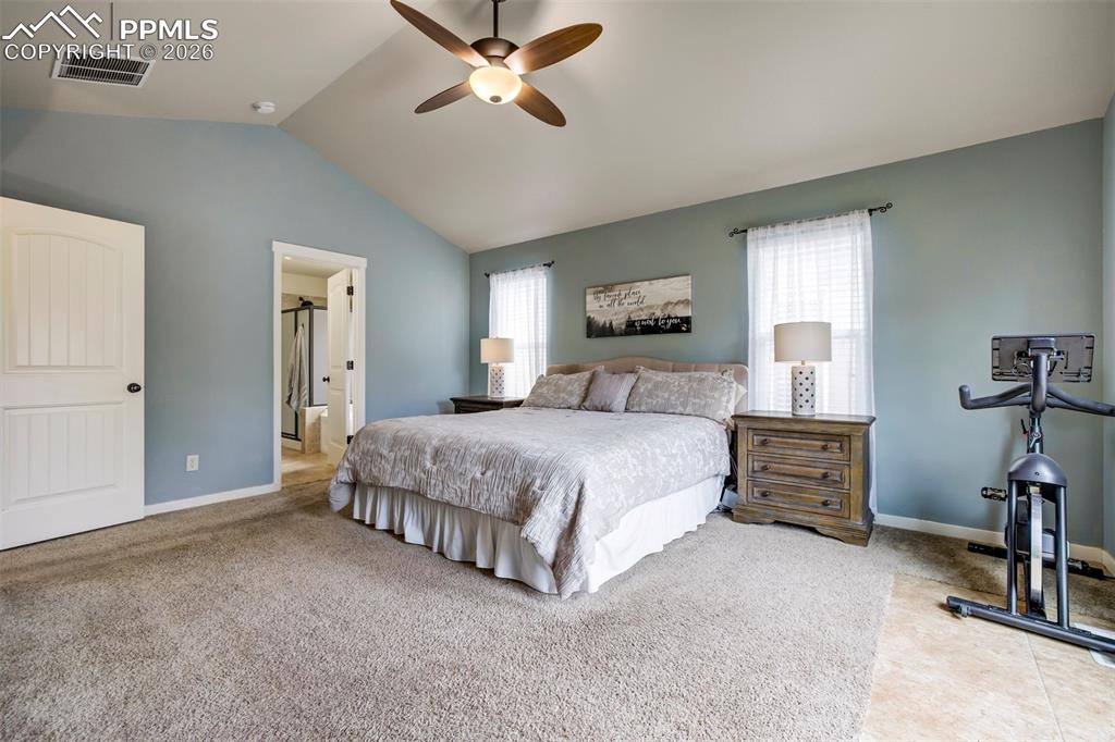 Image 16 of 50: Elegant primary suite