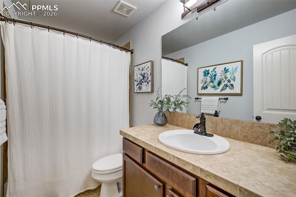 Image 24 of 50: Main level bathroom