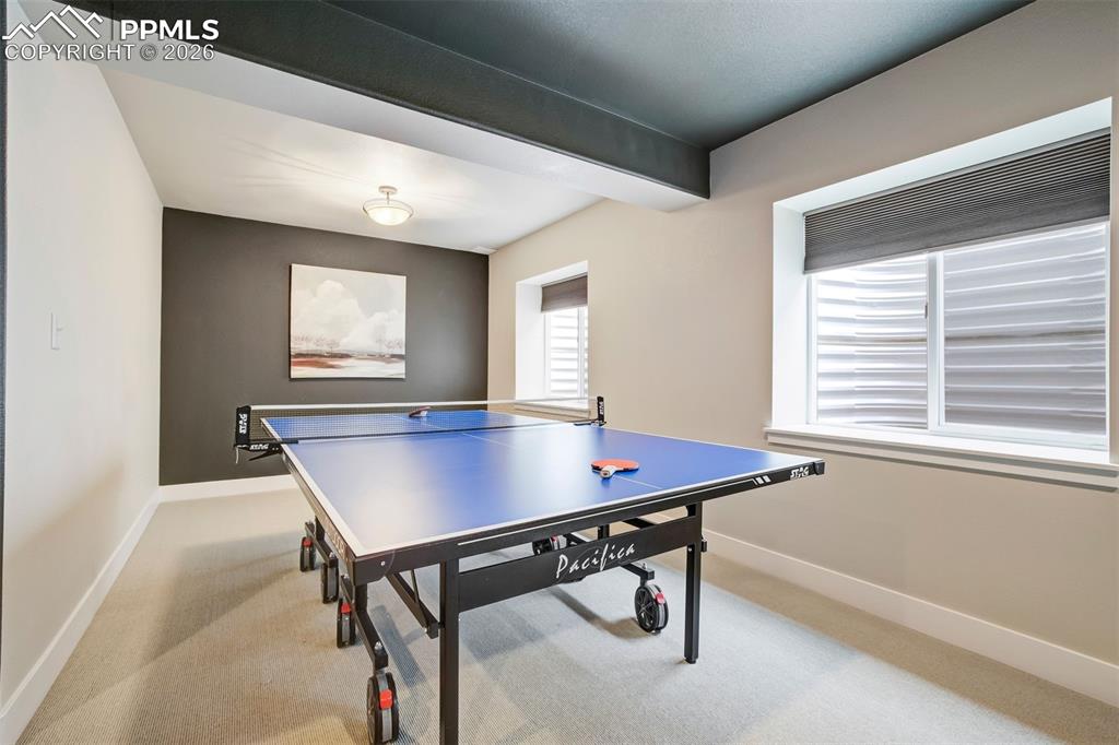 Image 28 of 50: Plenty of room for gaming in this family room