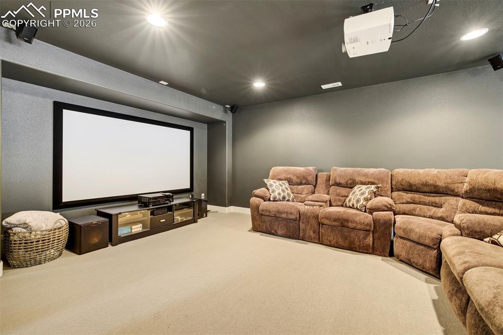 Image 30 of 50: Flex space currently set up as a home theatre