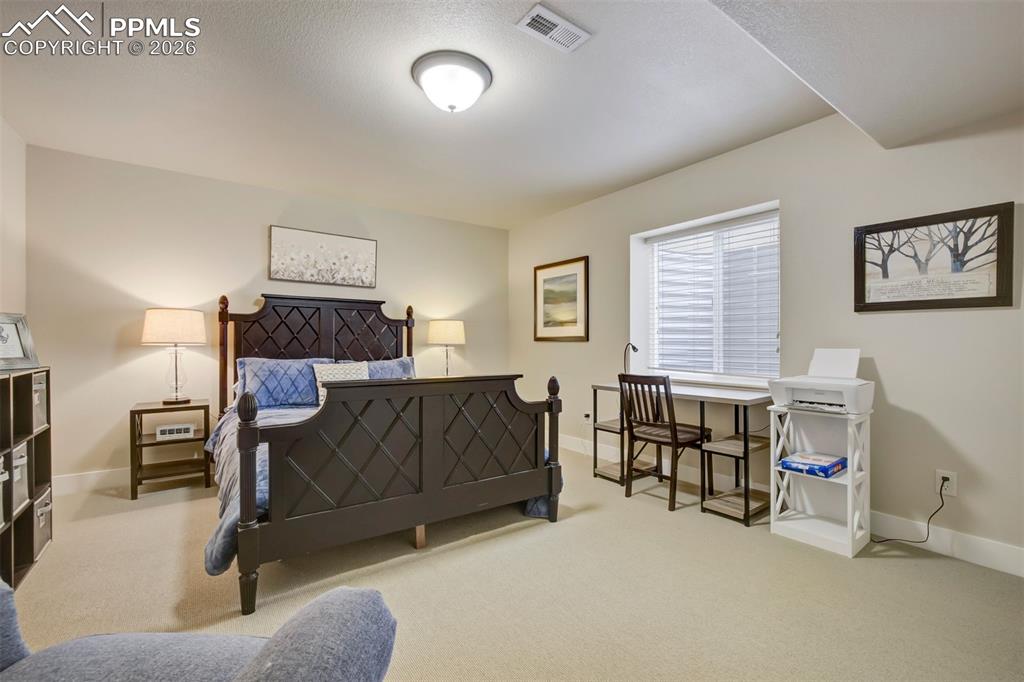 Image 36 of 50: 4th bedroom located in the basement