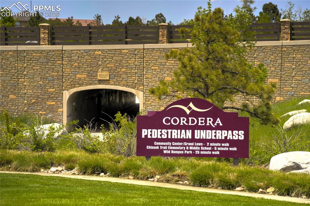 Image 47 of 50: Walking trail under Briargate Pkwy