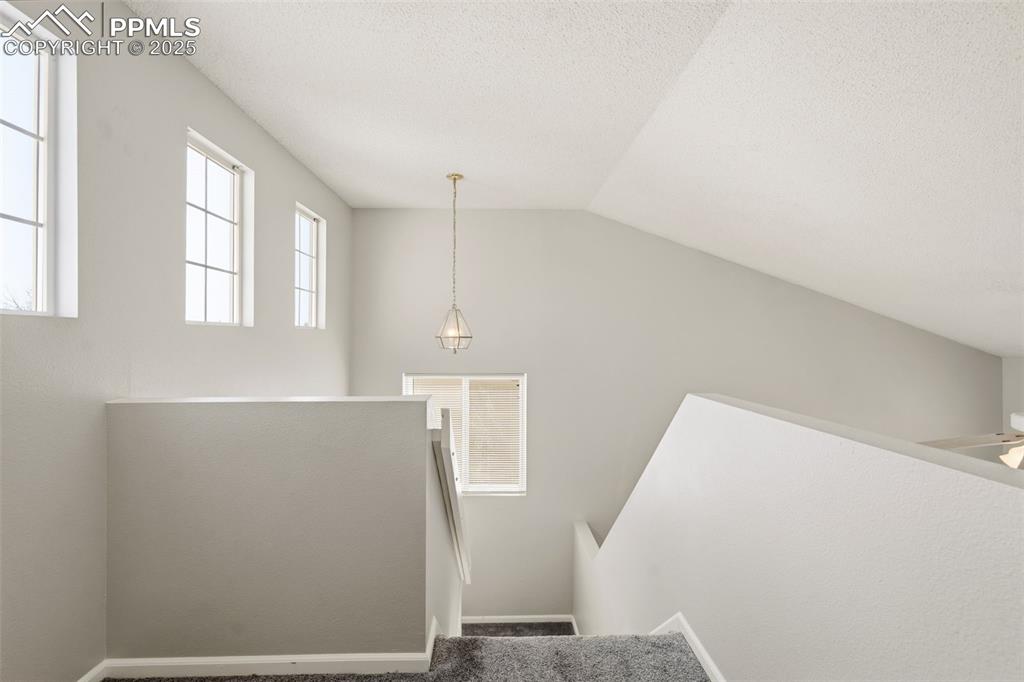 Image 15 of 25: Loft at the top of the stairs