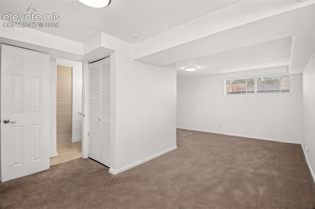 Image 16 of 44: Basement family room