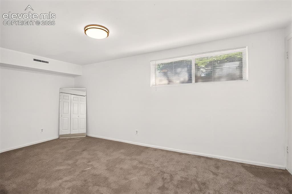 Image 17 of 44: Basement Bedroom