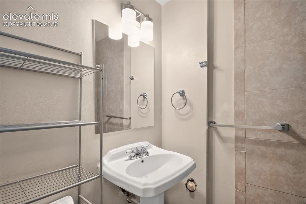 Image 40 of 44: Basement bathroom