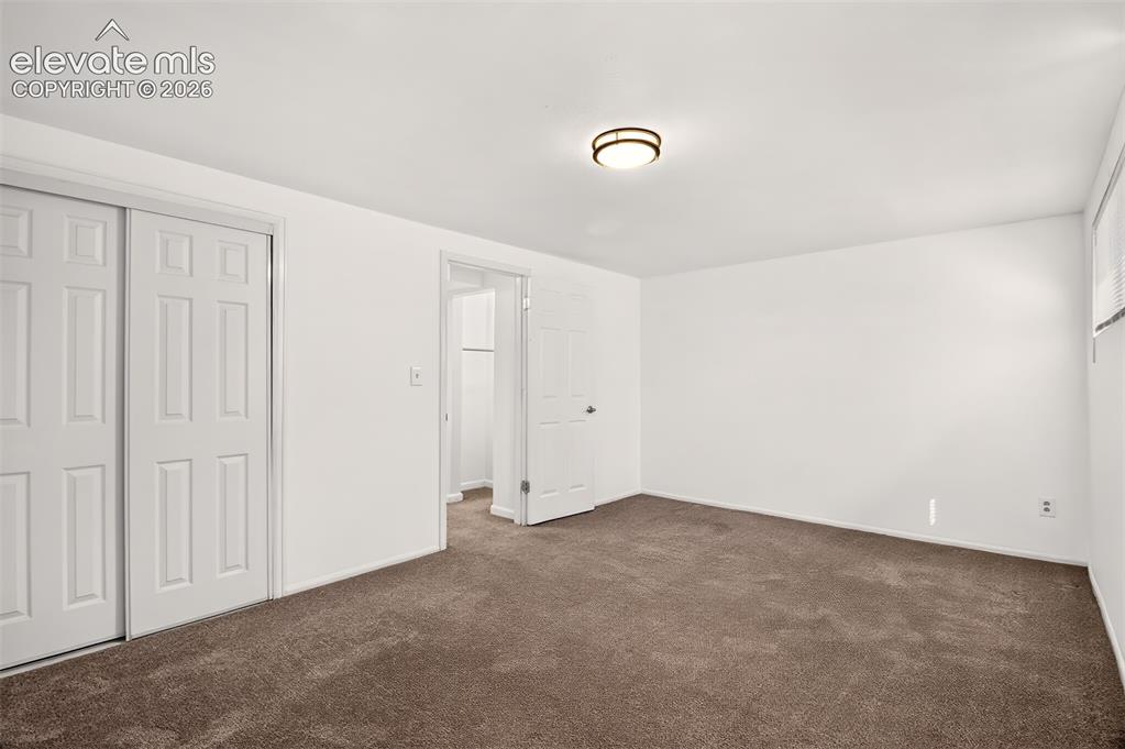 Image 41 of 44: Basement bedroom