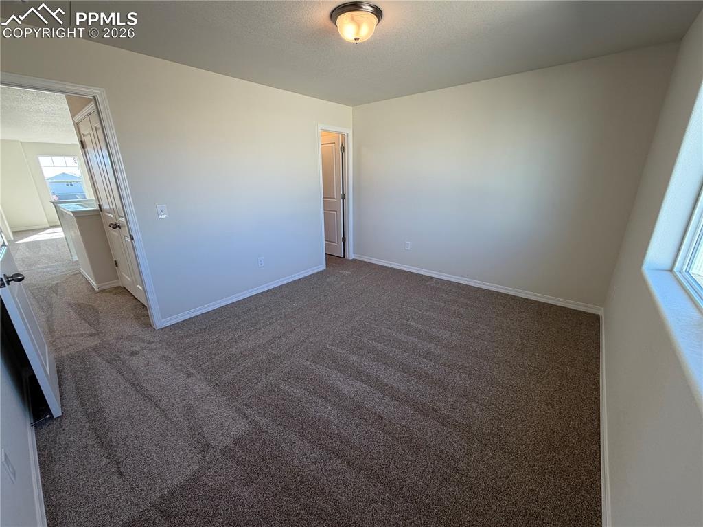 Image 12 of 19: Bedroom