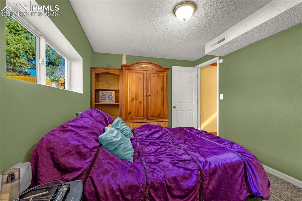 Image 22 of 31: Bedroom